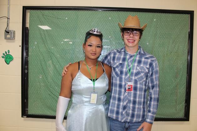 It’s the Princess and a Wild Wild West cowboy. From left are Alyssa Thibodeaux and Collin Fusilier.