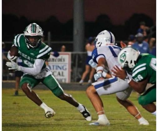 Eunice High’s junior wide receiver Brighton Laday fights for yardage in Eunice’s 35-16 loss to Erath last Friday. (Photo by Sports Editor Rhett Manuel)