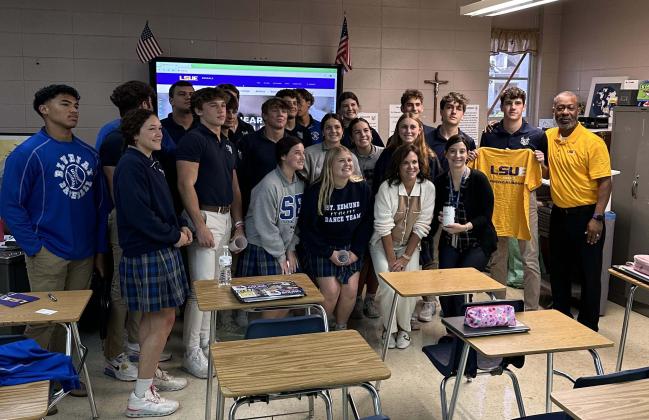 Chad Jones, institutional liaison officer and Cheryl Fruge, dean of academic affairs, presented different topics to St. Edmund seniors.