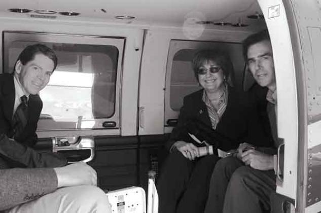 Author Robert Mann, left, on a State Police helicopter with the late Gov. Kathleen Blanco and journalist Tyler Bridges in 2004. (Photo Courtesy of Robert Mann)