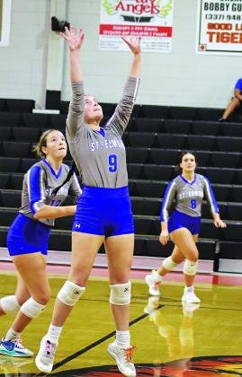 St. Edmund defeated Opelousas High in volleyball. From left, are, from left, Laura Kate Miller, Emma Myers and Millie Miller. (Photo by Amy Myers)