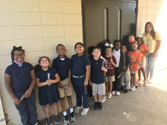 Top AR readers in Danielle Bertrand’s second grade class at East Elementary are from left, Aaliyah Robinson, Brilee Archangel, Carmello Alfred, Jiselle Castillo, Cayden Andrepont, Eli Lacombe, Ellie Deville, Ja’Marren White, Jayden Thomas, Mariah Ferguson, Rylin Blount and Zyria Fredrick and Bertrand.
