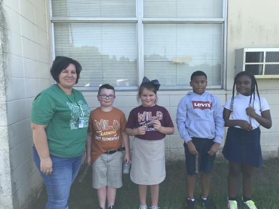 Top AR readers in Brandy Rozas’s third class at East Elementary were recognized. From left, are Rozas,  Bailee Hancock, Lucy Deville, Kohl Rhines and Ma’Kyri Victor.