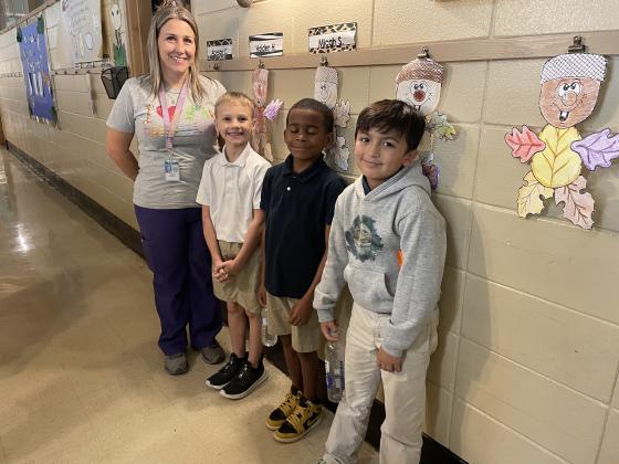 Top AR students in Allison Leckelt’s third grade class at East Elementary are from left, Leckelt, Blake Carrier, Brendon Arvie and Sawyer Perron.