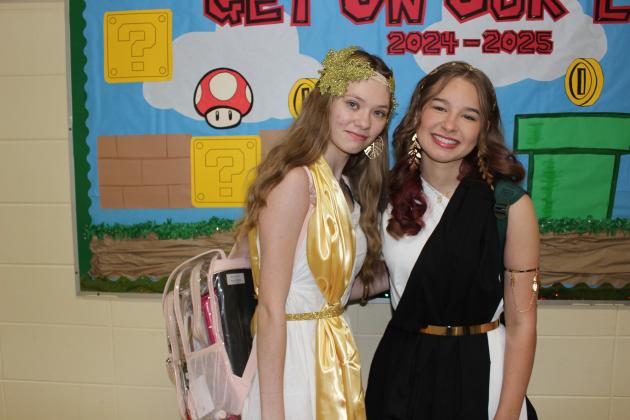 It was Toga Day for Eunice High seniors Monday. Students are celebrating homecoming week with different dress days. From left are Reagan Fruge and Lillie Dubroc.