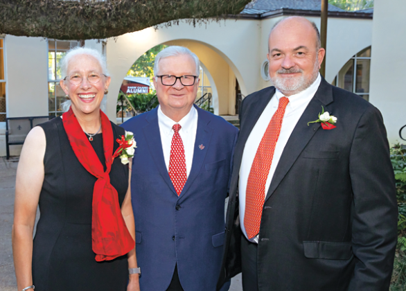 Dr. Amelie A. Hollier, left, and Harold G. Osborn III, right, are the University of Louisiana at Lafayette’s 2022 Outstanding Alumni. The honorees are shown with Dr. Joseph Savoie, UL Lafayette president, during a Sept. 29 reception at the University’s Alumni Center. (Photo by Doug Dugas / University of Louisiana at Lafayette) 