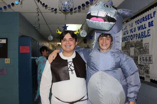 Shrek and Donkey were seen Monday at St. Edmund High School as students celebrate homecoming week. Monday was declared Movie Character Day. From left, are freshmen students Zachary Prather and Tripp Smith.