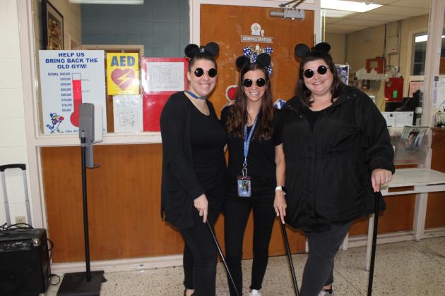 It was declared a Duo/Trio Day at St. Edmund Tuesday as students dressed the part for homecoming week celebration. St. Edmund High’s staff and teachers got into the fun. From left, are Lauren Touchet, Maggie Fuselier and Allison Reed.