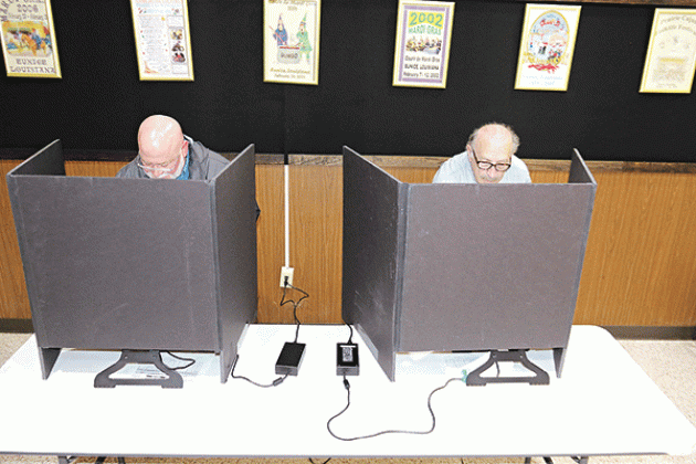 The early voting count for St. Landry Parish as of Thursday was 3,761 with 2,674 votes cast in-person and 1,087 absentee for the Oct. 14 election, according to the Louisiana Secretary of State’s website, geauxvote.com.  Early voting ended on Saturday at the Eunice City Hall and Registrar of Voter’s Office in the courthouse in Opelousas. Marion “Nootsie” Sattler, a Eunice alderman, and Michael Coscino, of Eunice, vote at the Eunice Municipal Complex lobby on Thursday. The election includes candidates for gov