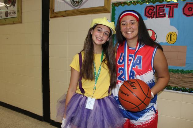 Aubree Hughes, a sophomore, and EHS girls basketball coach Kassi Thibodeaux on Wednesday.