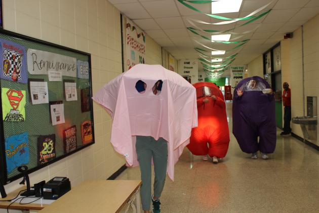 Eunice High teachers took part in dressing up for homecoming festivities. Above are Jeanne Elfert, left, Therese Gianfala, and Alicia Guillory Bielstein. (Photos by Myra Miller)
