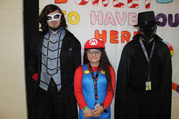 Seniors at Eunice High dressed as their favorite board game or video game character Wednesday. From left are Seniors Malachi Thibodeaux, Kinslee Thomas and Caden Schoeffler.
