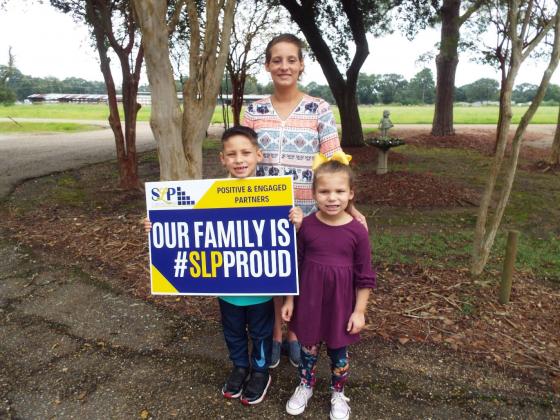 Winners of the Family Photo Contest at Glendale Elementary were honored. From left, are Kord Strother, Brazilyn Strother, Raley Strother, mother, and Jacob Strother, father, is not pictured.