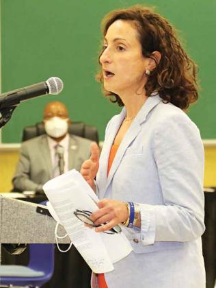 Dr. Tina Stefanski, regional medical director for Region 4, speaks about quarantine issues at Thursday’s St. Landry Parish School Board meeting. (Photo by Harlan Kirgan)