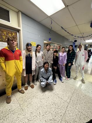 Students at St. Edmund High School celebrate homecoming week. Pajama Day was Wednesday on campus. From left, are Seth Aucoin, Ava Smith, Millie Miller, Jillian DeVillier, Gage Smith, Caroline Lavergne, Aubrie LeJeune, Bo Thomassee and Seyda Deshotel. (Submitted photo)