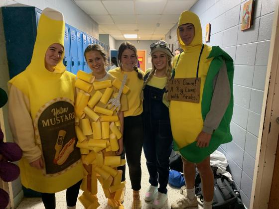 St. Edmund students dressed in yellow Wednesday were Laura Beth Zaunbrecher, Claire-Beth Prudhomme, Kate Miller, Isabella Heinen and Copeland Miller.