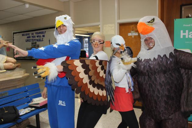Homecoming week at St. Edmund allowed students to dress in different attire during the week.  Monday was USA Day. From left are Ross Bertrand, Laura Kate Miller, Sara Feucht and Jillian DeVillier.