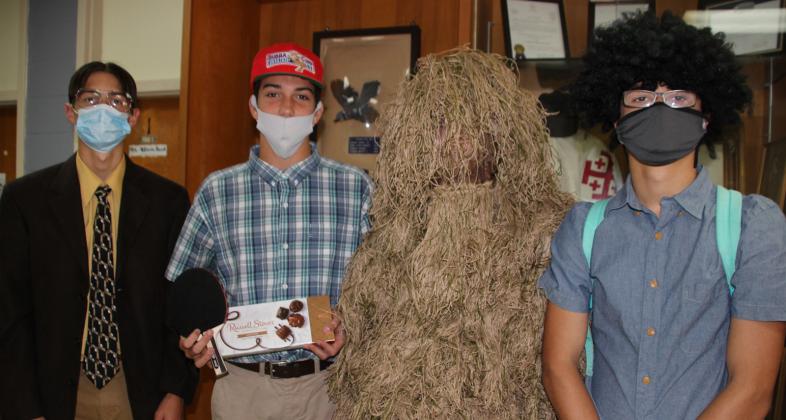 “Movie Day” was the declared homecoming dress day Monday. From left, are, Nick Bertrand, senior, Copeland Miller, sophomore, Mason Sattler, senior, and Nathan Andrepont, senior.
