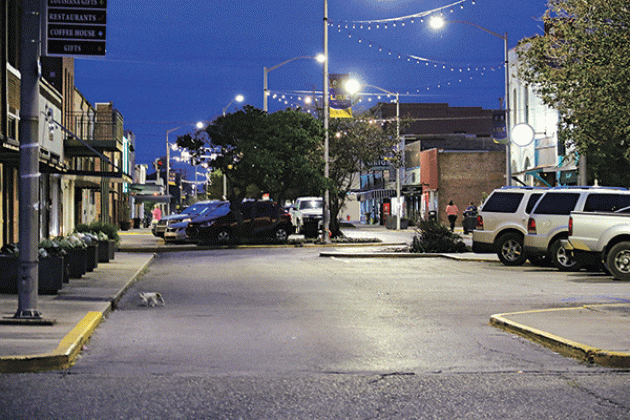 South 2nd Street resident Paul Feavel said the downtown area changes late at night and after midnight into a rowdy scene. Feavel spoke at Tuesday’s Board of Aldermen meeting where an ordinance against loitering was passed. The scene above was taken after the city council meeting. (Photos by Harlan Kirgan)