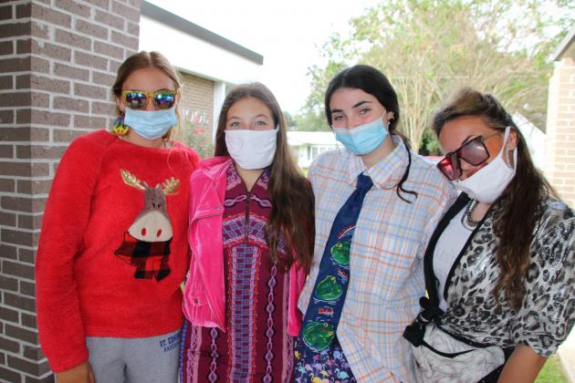 Some different dressed students at St. Edmund High were seen Wednesday as they dressed in their “Tacky” clothing attire for “Tacky Day.” From left, are Audrey Chaumont, senior, Ava Guillory, sophomore, Sabey Coleman, sophomore, and Elizabeth McGee, a senior.