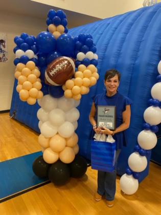 St. Edmund Homecoming Parade Marshal Michele Stelly at the school's pep rally