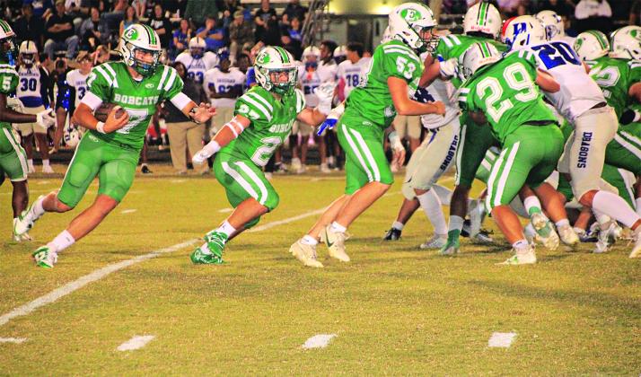 Bobcat running back Montana Brown looks for daylight against DeRidder.
