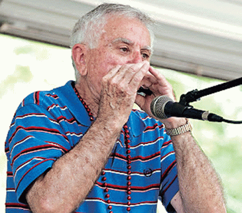 Jerry Devillier performs at the 2010 Louisiana Folk Roots Heritage Day in Chicot State Park. (Photo by David Simpson)