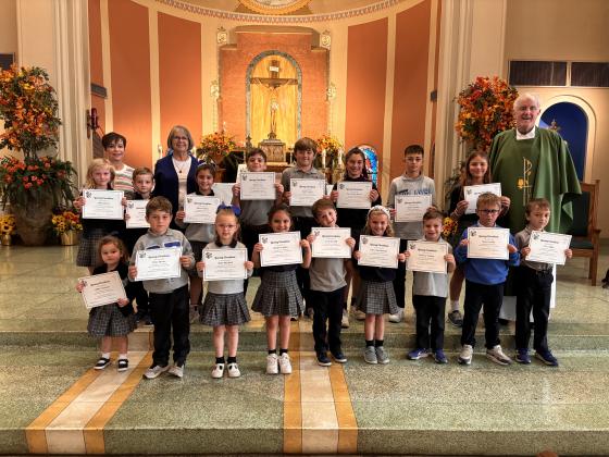Young Christians for the first nine weeks of the school period at St. Edmund were honored and chosen.