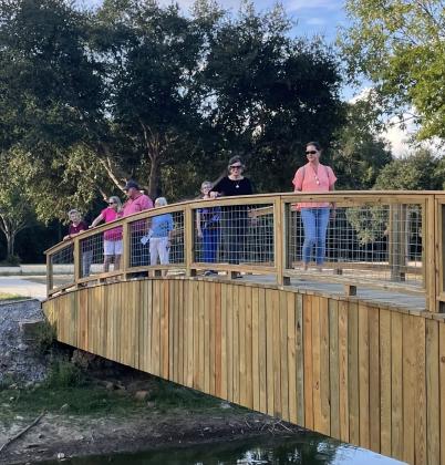 Louisiana Garden Club Federation District VII Director Ammy Taylor attended the Bulb &amp; Blossom Garden Club’s October meeting and visited the Eunice Nature Park and Walking Trail. On one of the bridges are, from left, Erin Jones, Martha Guempel, Barrett Lyons, Fran Guillory, Lonell White, Lynn Pavich and Ammy Taylor.
