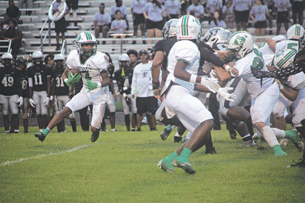 Eunice High’s Malik Thomas hunts for a hole in the Northwest defense. (Photo by Rhett Manuel)