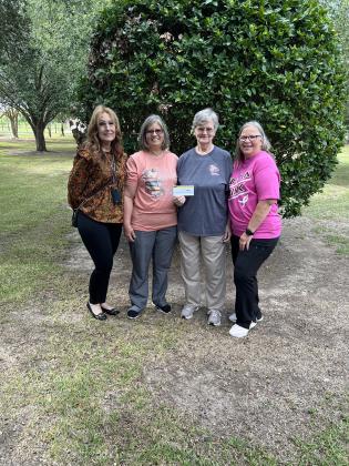Delores Frey with Eunice Community Health Center donated a check to Highland Early Learning Center’s annul Walk for The Cure.