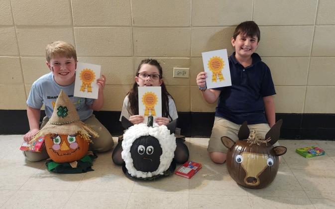 In the pumpkin decorating contest, East Elementary winners were from left Bodhi Hannon, 1st place, Arabella Ardoin, 2nd place, and Cayden Andrepont, 3rd place. (Submitted photo)