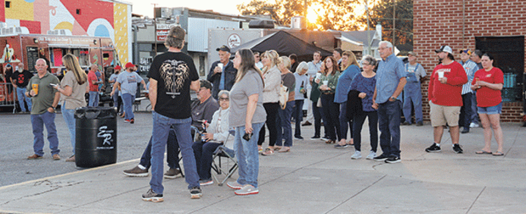 The second Fall into Downtown was held at 2nd Street and Walnut Avenue on Thursday. The crowd was building by sunset as the Grammy-winning Lost Bayou Ramblers performed.  Later, Three Thirty Seven would take the stage to a packed downtown. (Photos by Harlan Kirgan)