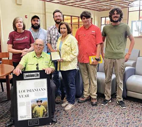 Front, from left, are  Dr. Malcolm Vidrine, PhD, Louisianian Conservationist of the Year, and Margaret Frey, Volunteer Recognition Award. Back, from left, are Annette Parker, Society outgoing president, Steve Nevitt, CPHPS president, Colby LeJeune, Society vice president, John Michael Kelley, speaker and Eric Van Bergen, Ascension Episcopal School Cajun Prairie Project. (Submitted photo)