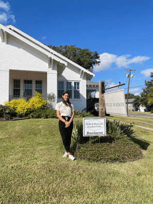 Belle Maison located at 201 S. 3rd St. is the recipient of the Business Yard of the Month by Bulb and Blossom Club of Eunice. The neatly trimmed yard is landscaped with Sunshine Ligustrum, knockout roses and purple angelonia. Congratulations to owner Katherine Bacon. Pictured is Baylee LaFleur. (Submitted photos)