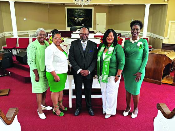 NAUW members attended Mt. Pilgrim Baptist Church. From left, are Carolyn Baldwin, Rochelle Milton, Rev. Chad Ned, Shelsy Williams, president; and Patricia Harrison, 2nd vice president.