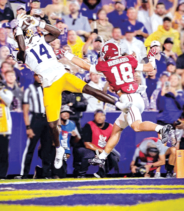 LSU’s Trey’Dez Green snags a pass against Alabama. (Photos by Dwight Jodon)