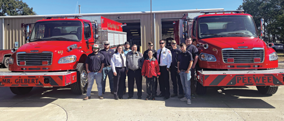 Attending a dedication for two new fire trucks in Fire District 6 on Sunday, from left, were  Karson Brown, Dylan Frey, Phyllis Vail, Jason Garrido, Thomas Vail, Elizabeth LaFleur, Gaige Miller, Chaise Brown, Dylan Fontenot, Cameron Vail and Devin Gaspard. (Submitted photo)