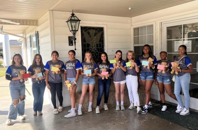 The Royal Select 14u Softball team surprised Oak Lane residents with special gifts and hand written cards.