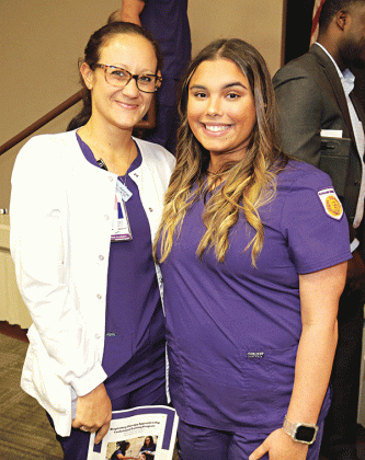 The first LSUE apprentices in the Respiratory Care Therapy program are, from left, Sydney Romero, of New Iberia, and Victoria Roshto, of Opelousas. (Photo by Harlan Kirgan)