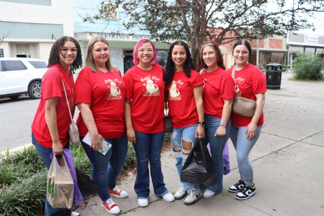 A group of friends wear matching shirts as they shop together during the annual Noel on the Prairie Saturday. From left, are Jana’lyn McQuirter, Judy Blanchard, Alyslyn McQuirter,Akashaa Hall, Danielle Thibodeaux and Gracie Godeaux.