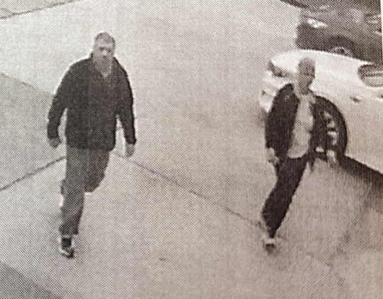 Surveillance image of two people suspected of Cadillace Deville sedan in Crowley. (Photo released by Acadia Crime Stoppers)