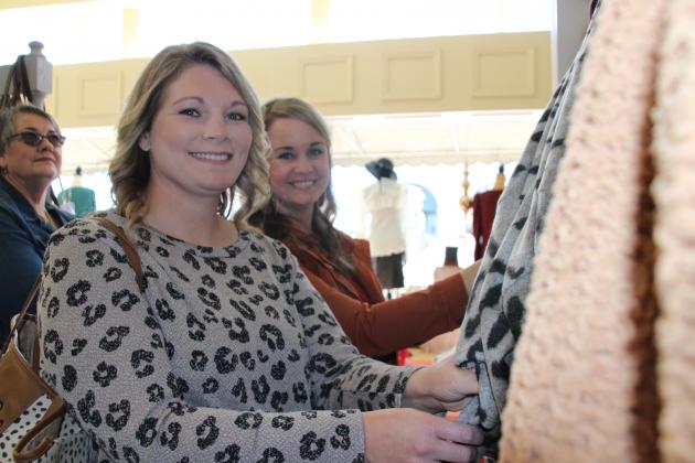 Hayley Guidry and Kim Turner are shopping at Sweet &amp; Sassy Boutique during Saturday’s Noel.