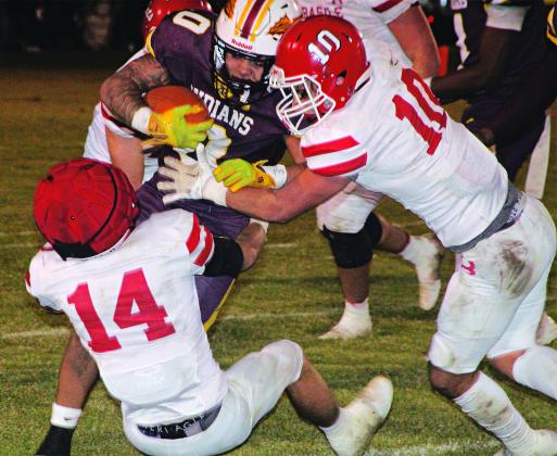 Basile Bearcats stop an Elton runner in a playoff game Friday. Elton won 22-18. (Photo by Rhett Manuel)