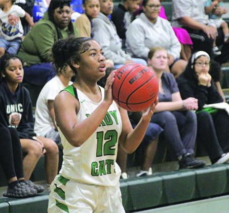 Akeviona Monday, a junior, dropped in 22 points for the Lady Cats in a winning effort against Pine Prairie.
