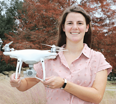 Caitlin deNux holds a drone on the LSUE campus on Tuesday. (Photo by Harlan Kirgan)
