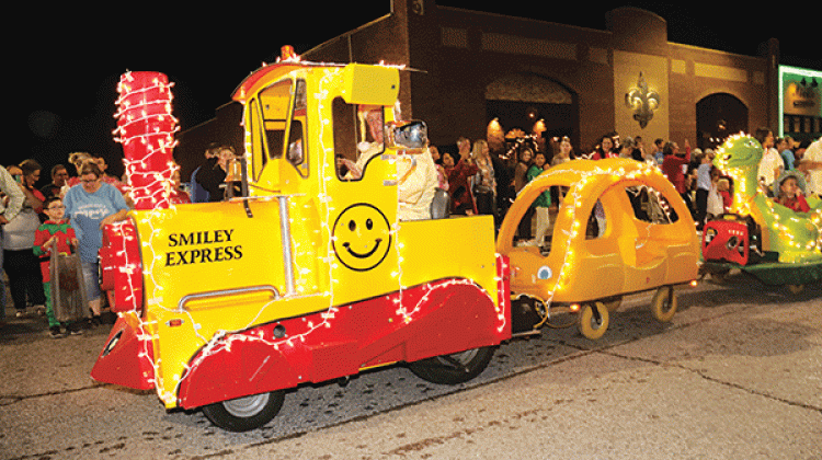 Former Mayor Kenneth Peart’s Smiley Express brightens the 2021 Eunice Christmas Parade. The parade is scheduled on Dec. 15 (Photo by Harlan Kirgan)