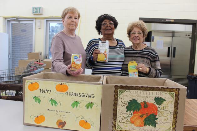 Beta Sigma Phi Sorority gave two boxes of a variety of food items and a  Super 1 Foods gift card to the Eunice Food Bank. A drawing for the gift card was held and name pulled and the winner is Deanna  Poullard.