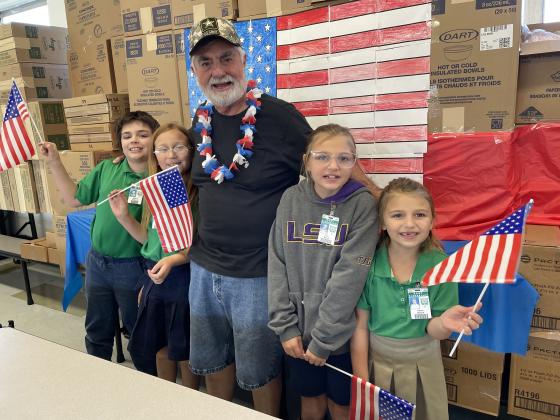 One of the veterans in attendance at East Elementary’s Veterans Day event was Daniel Ray Young who is pictured with his four grandchildren who attend East Elementary, Matthew Richard, Harlee Richard, Rylin Blount and Karsyn Blount.  (Submitted photos)