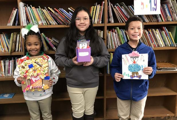 East Elementary students participated in a “Disguise the Turkey” art contest. Winners were announced.  From left, are Alaiyah Fontenot, Enola Schoeffler and Jayden Archangel.